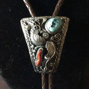 Bolo tie, Rare piece to find sterling silver Navajo bolo with turquoise and red